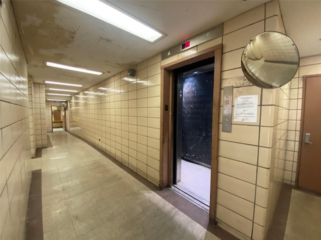 corridor featuring elevator