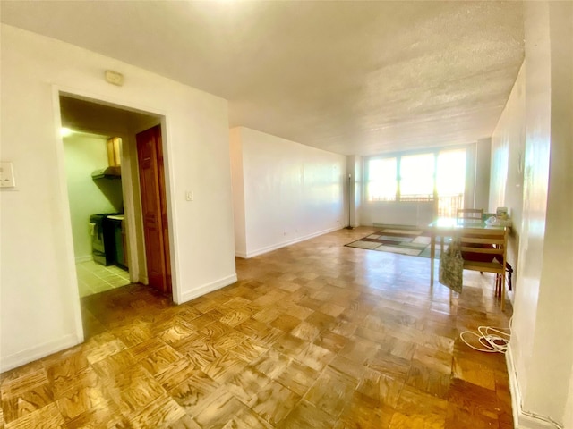 unfurnished room featuring light parquet flooring