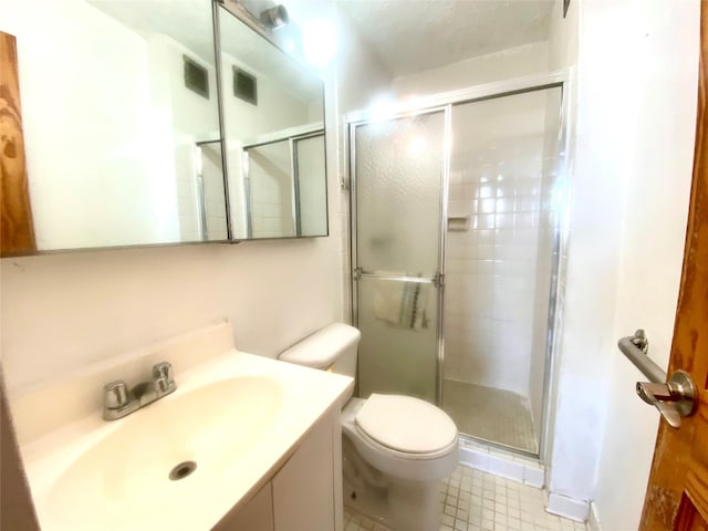 bathroom with vanity, toilet, and walk in shower