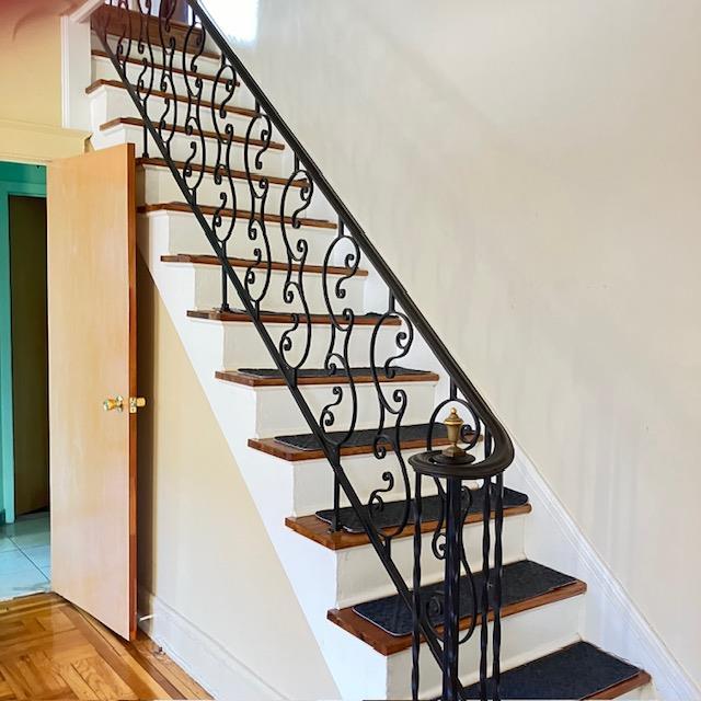 stairway with parquet floors