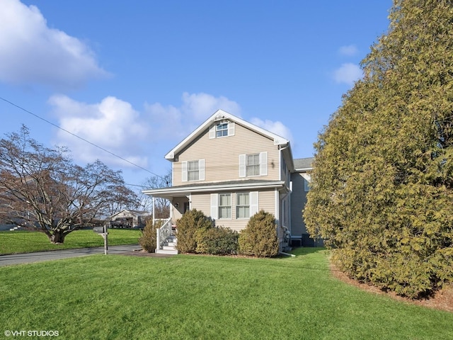 view of front of property with a front yard