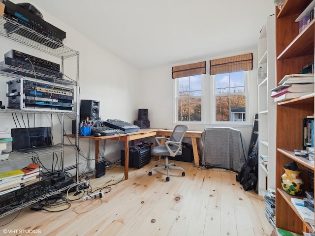 office space with wood-type flooring