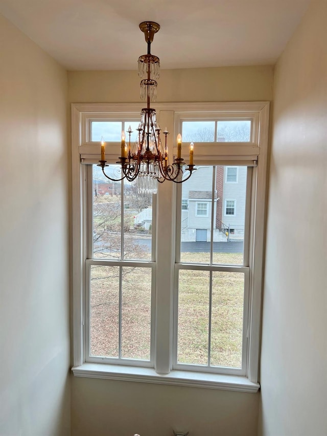 interior space with a notable chandelier