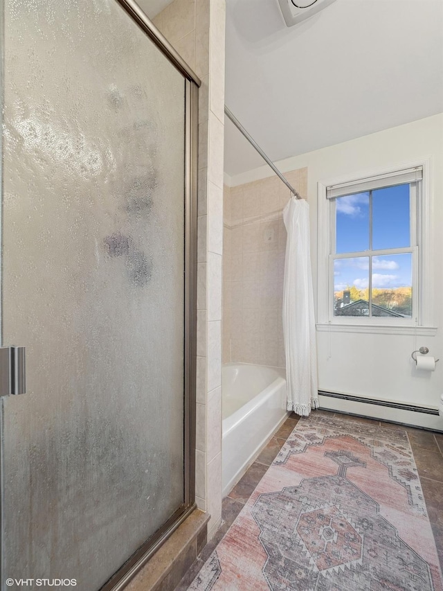 bathroom with a baseboard radiator and shower with separate bathtub