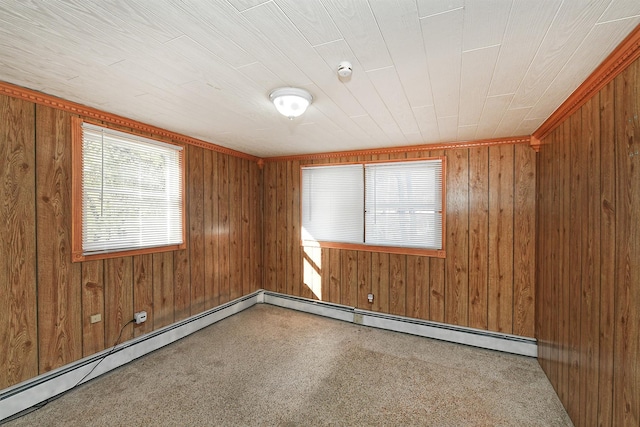 unfurnished room with wood walls