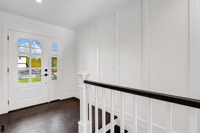 entrance foyer featuring dark wood-type flooring