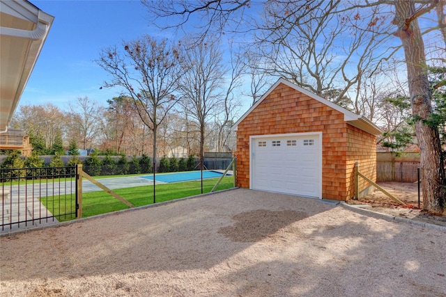 garage featuring a yard