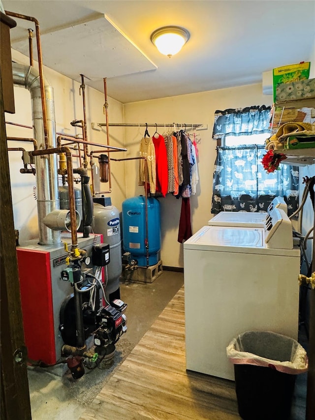 laundry room with washing machine and clothes dryer