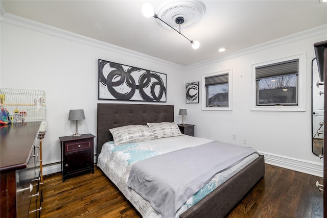 bedroom with baseboard heating, dark hardwood / wood-style floors, and ornamental molding