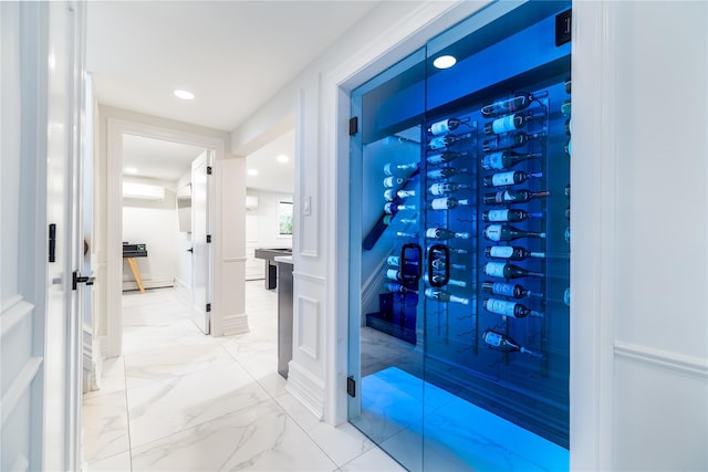 wine room featuring an AC wall unit