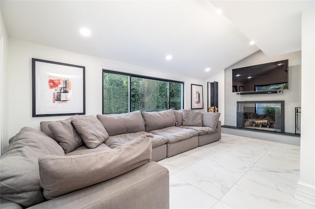 living room featuring lofted ceiling