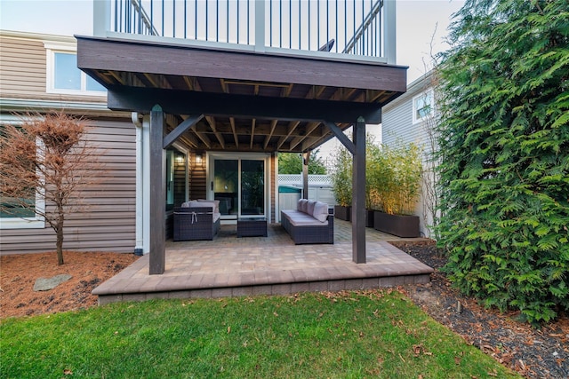 view of patio / terrace with an outdoor living space and a balcony