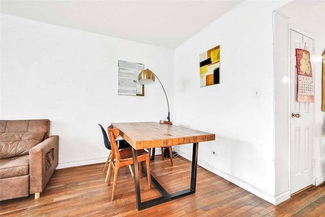 dining area featuring hardwood / wood-style flooring