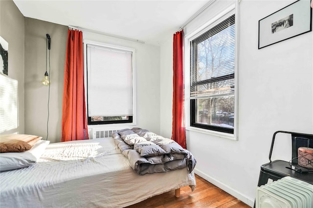 bedroom featuring hardwood / wood-style flooring