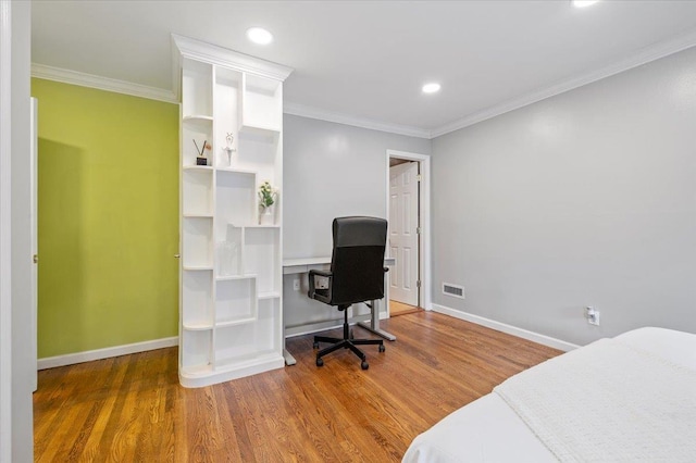 bedroom featuring dark hardwood / wood-style floors and ornamental molding