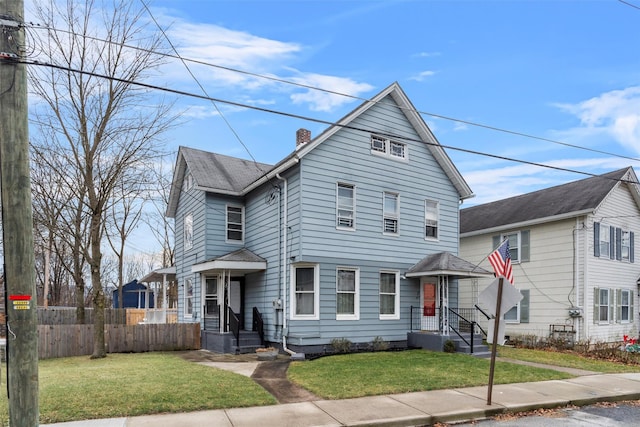 front of property with a front yard