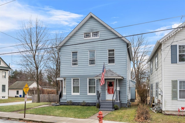 front of property featuring a front lawn