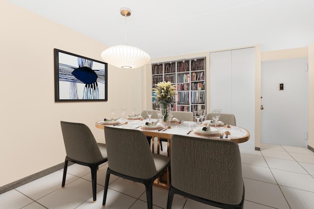 dining room featuring light tile patterned flooring