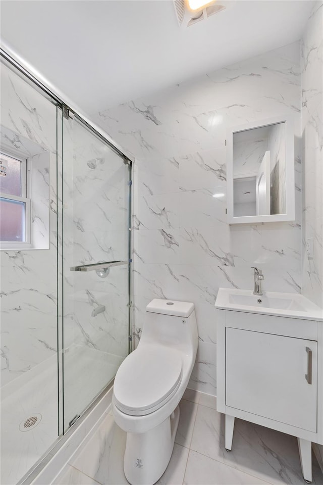 bathroom featuring an enclosed shower, vanity, and toilet