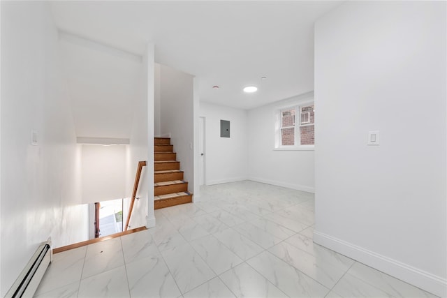 interior space featuring electric panel and a baseboard heating unit