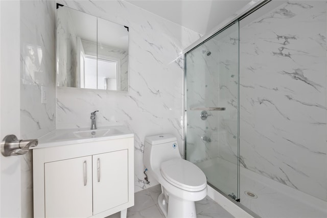 bathroom featuring vanity, toilet, tile walls, and a shower with shower door