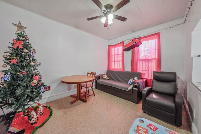 living room featuring ceiling fan