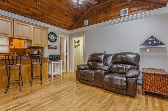 living room featuring light hardwood / wood-style flooring, ceiling fan, a baseboard heating unit, vaulted ceiling, and wooden ceiling