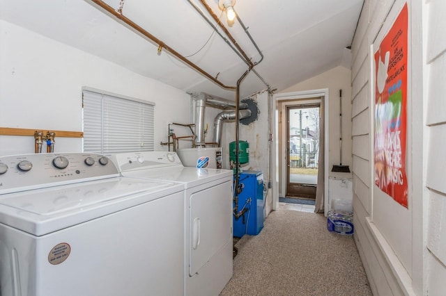 washroom with light colored carpet and washer and clothes dryer