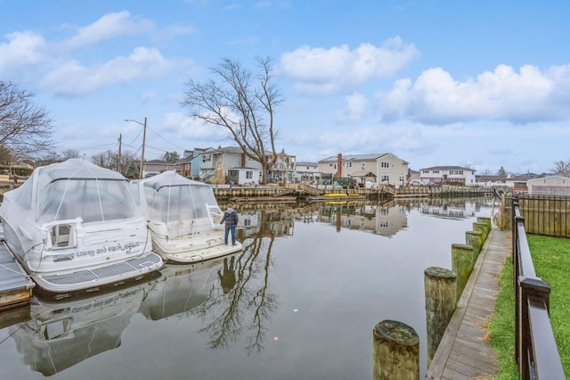 dock area featuring a water view