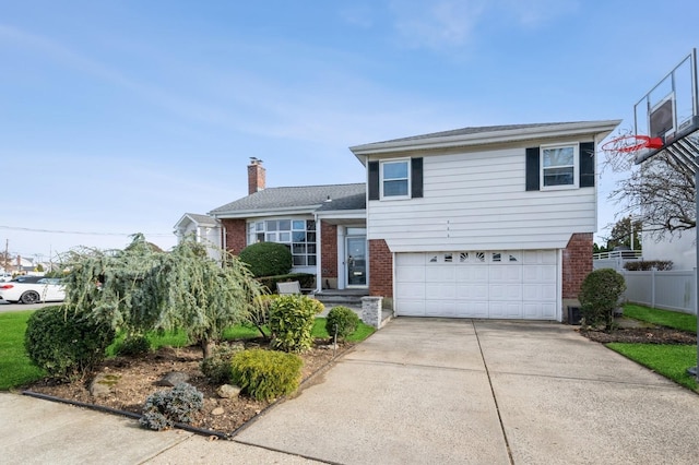 split level home with a garage