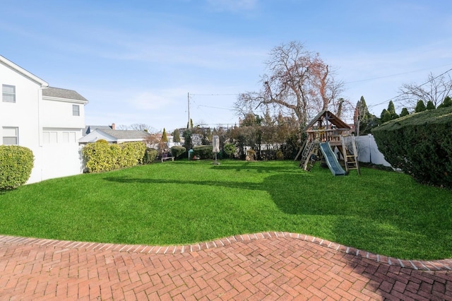 view of yard with a playground