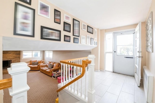 interior space with a fireplace and radiator