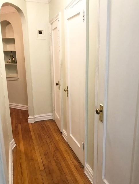 corridor featuring hardwood / wood-style flooring