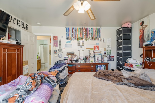 bedroom featuring ensuite bathroom and ceiling fan