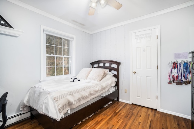 bedroom with a baseboard radiator, crown molding, ceiling fan, and dark wood-type flooring