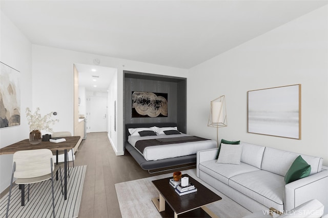 bedroom with wood-type flooring