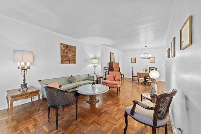 living area featuring a chandelier