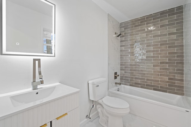 full bathroom featuring toilet, vanity, and tiled shower / bath