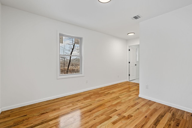 empty room featuring light hardwood / wood-style floors