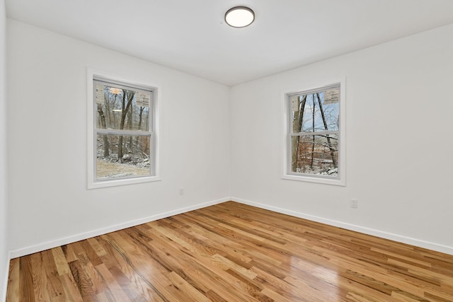 empty room featuring hardwood / wood-style flooring