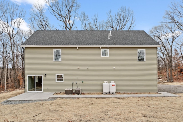 back of property featuring a patio area and cooling unit