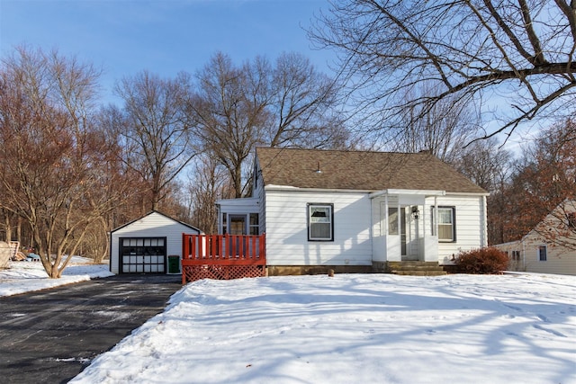 view of front of house featuring an outbuilding and a garage