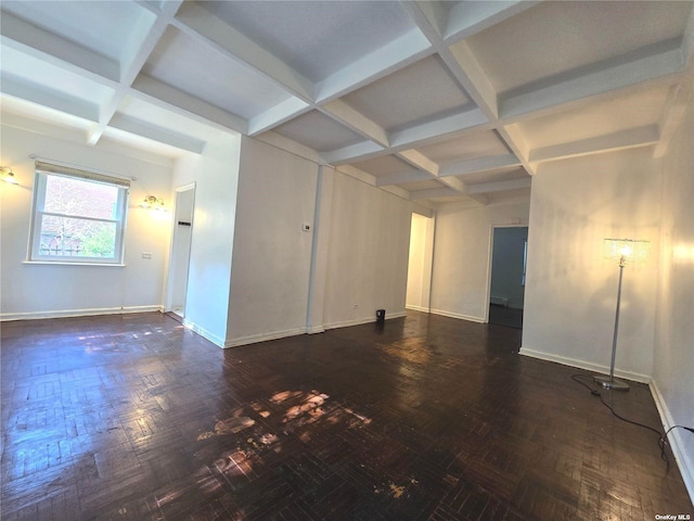 spare room with beam ceiling and coffered ceiling