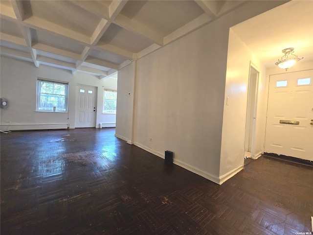 entryway with beam ceiling, a baseboard radiator, and coffered ceiling