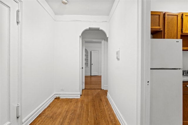 corridor featuring light hardwood / wood-style flooring