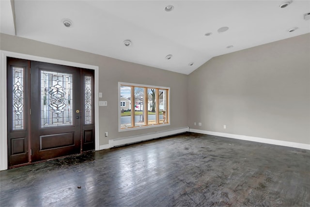 foyer entrance with a baseboard radiator and vaulted ceiling