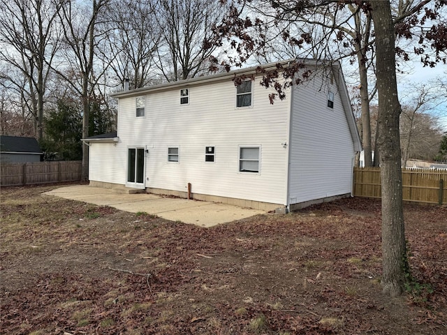 rear view of house with a patio