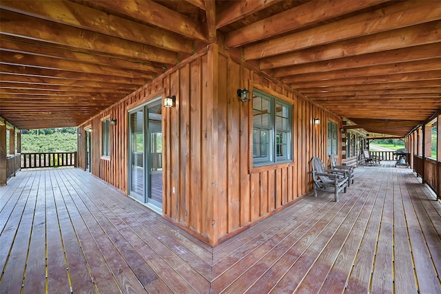 wooden deck featuring covered porch