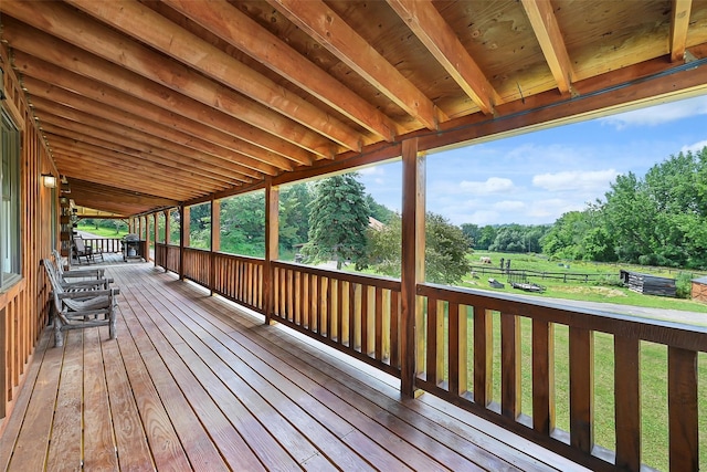 wooden deck featuring covered porch