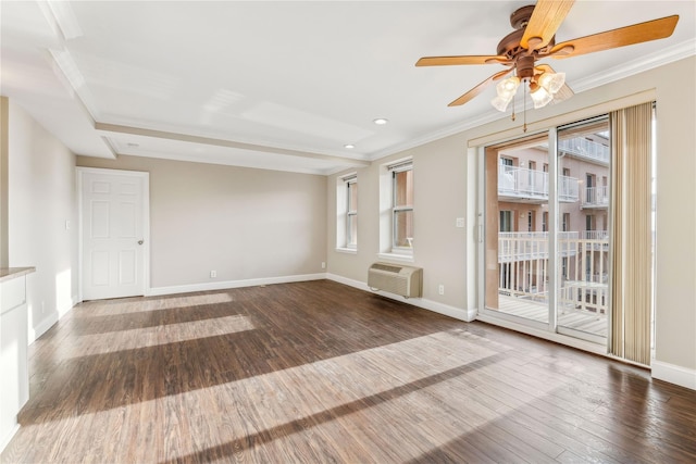 interior space featuring dark hardwood / wood-style flooring, an AC wall unit, plenty of natural light, and ceiling fan